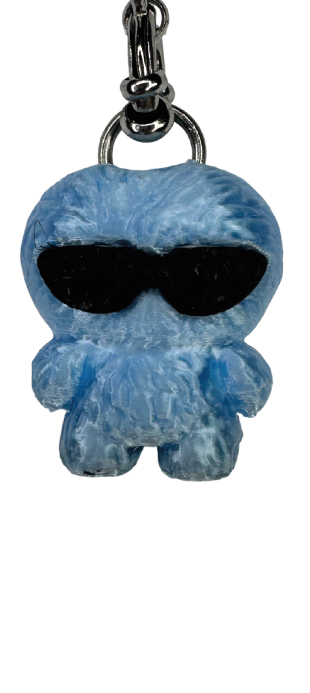 Charm muñeco azul
